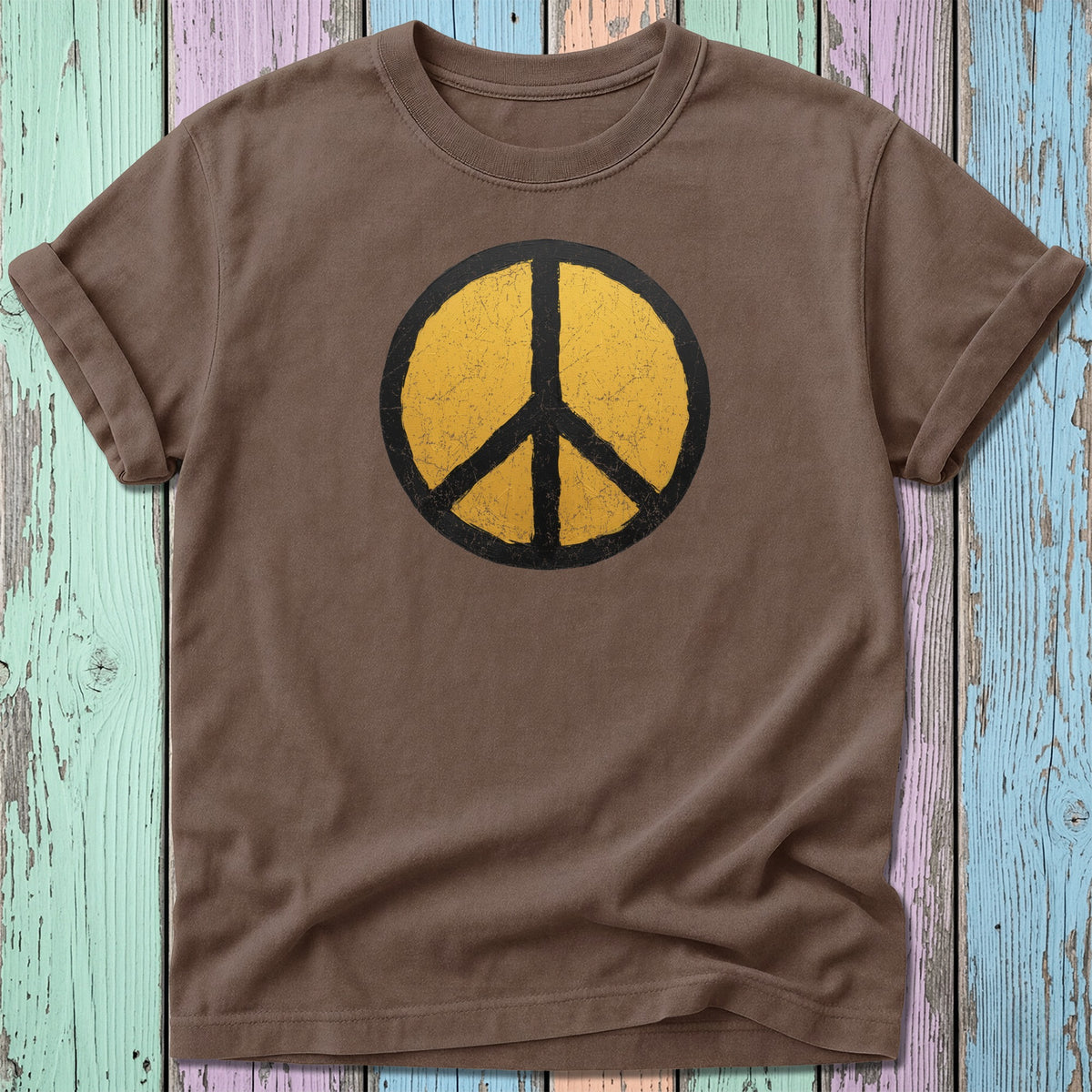 Brown t-shirt with distressed yellow peace sign graphic.