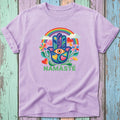 Lavender t-shirt with rainbow Hamsa hand, eye, flowers, and "NAMASTÉ" text.