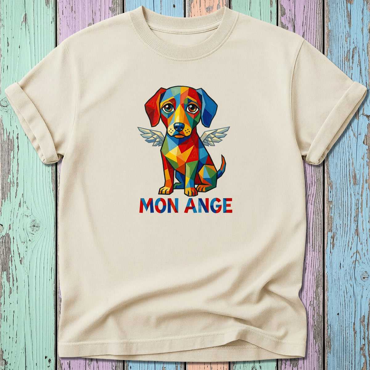 Beige t-shirt with a geometric, colorful dog with wings and text "MON ANGE".