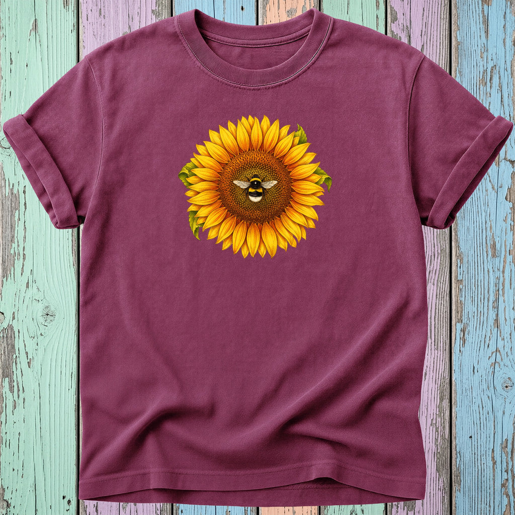 Burgundy t-shirt with a sunflower and bee graphic.