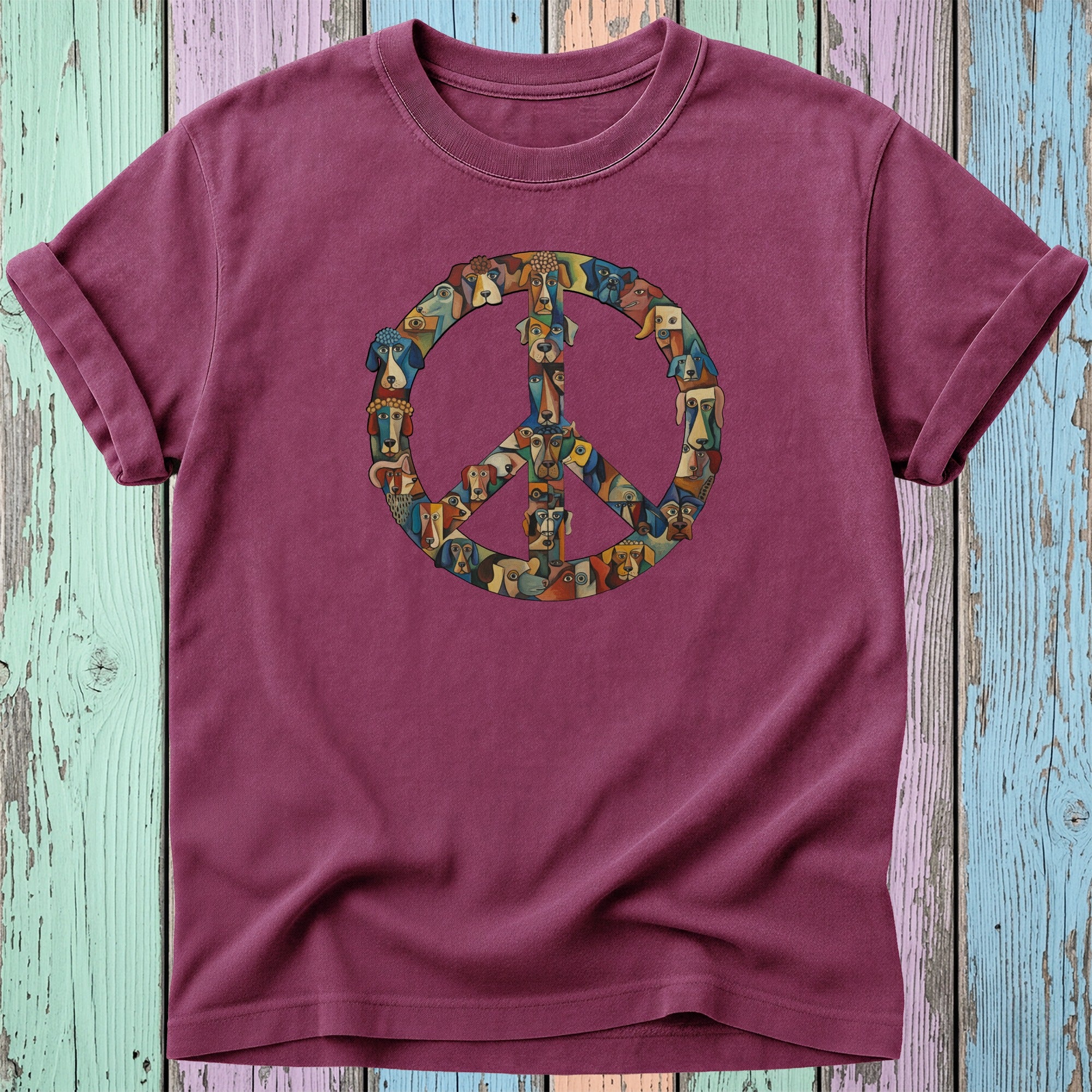 T-shirt with a peace sign made of dog faces.