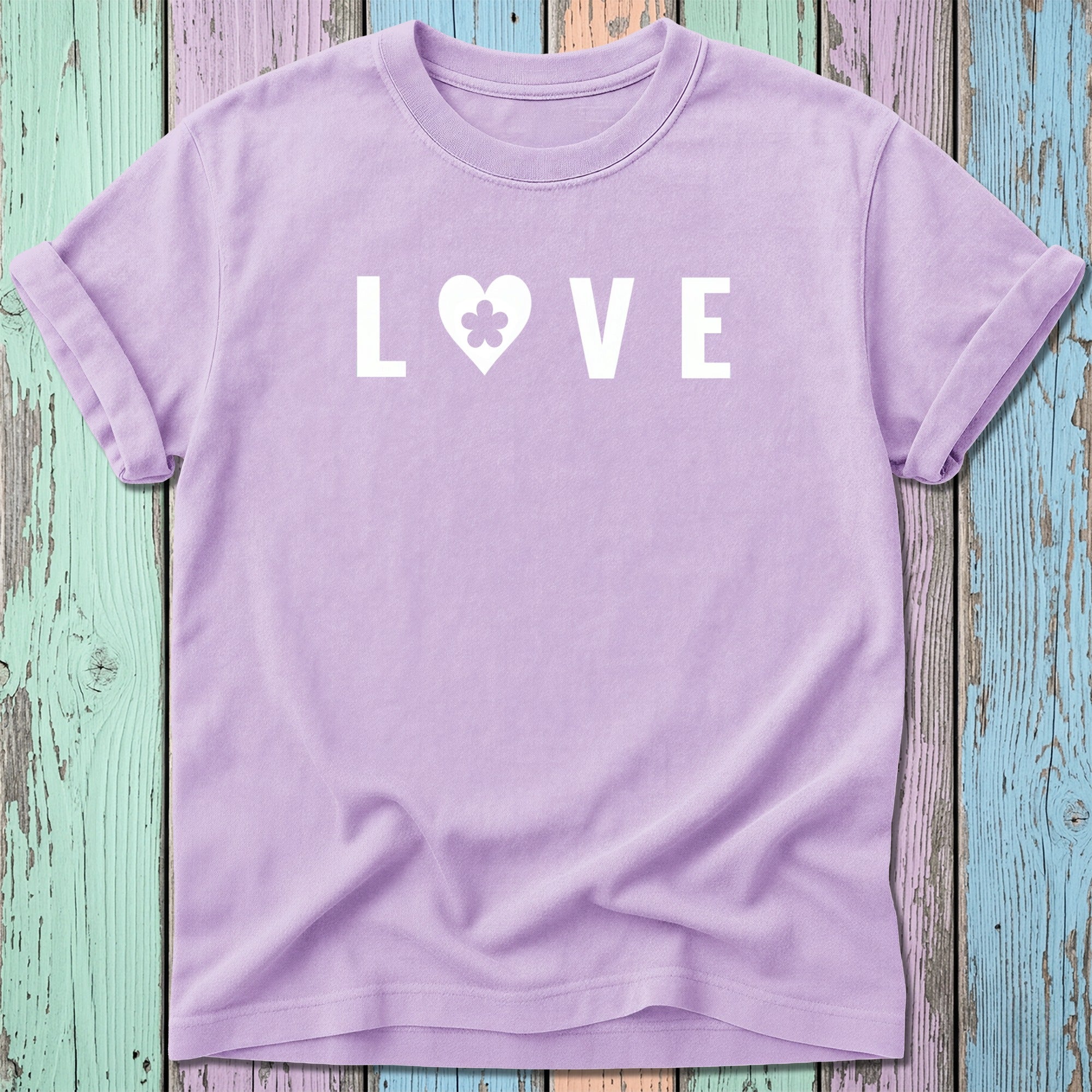 Purple t-shirt with "LOVE" and a clover heart graphic.