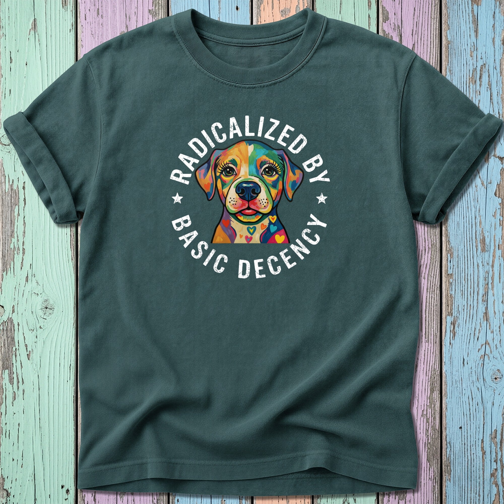 T-shirt with colorful dog graphic and "Radicalized by Basic Decency" text.